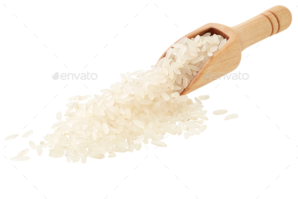White rice in a wooden spoon - Stock Photo - Images