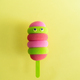 Colored ice cream popsicle on a pastel yellow background. Minimal summer concept - PhotoDune Item for Sale