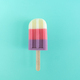 Colored ice cream popsicle on mint background. Minimal summer concept. - PhotoDune Item for Sale