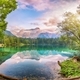 Incredible view of sunset over Fusine lake with Mangart peak on background. - PhotoDune Item for Sale