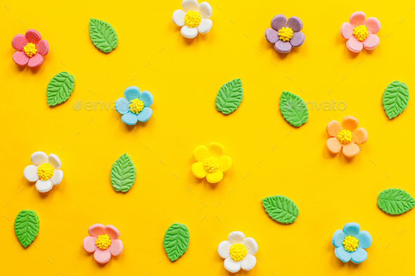 Stylish colorful flowers flat lay on yellow background. Modern festive holiday banner - Stock Photo - Images