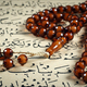 Quran the holy book of muslim religion and Pray Counting Bead - PhotoDune Item for Sale