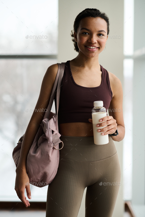 Young sportive girl in gym - Stock Photo - Images