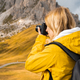 Woman takes photos of scenic Passo Giau - PhotoDune Item for Sale
