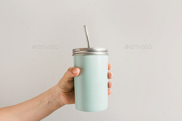 Reusable blue jar with metal straw for summer drinks. Individual use. Zero waste concept. - Stock Photo - Images