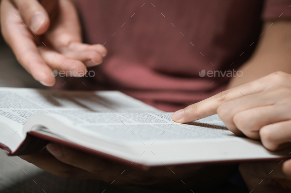 Christian religion concept Young couple reading bible to study God\'s love, faith, hope, love