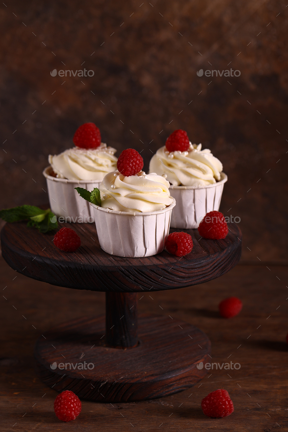 fresh dessert cupcake with vanilla cream - Stock Photo - Images