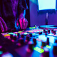 Close up of DJ hands on dj console mixer during concert in the club - PhotoDune Item for Sale