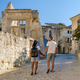 a couple on vacation in the Provence France walking at the streets of the French village Les Baux  - PhotoDune Item for Sale