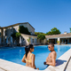 couple relaxing by the swiimingpool in the Provence France, mluxury resort France - PhotoDune Item for Sale