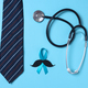 Stethoscope, necktie and blue ribbon symbol of prostate cancer awareness  - PhotoDune Item for Sale