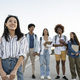 portrait of a group of multiracial students looking at camera - focus on asian woman - - PhotoDune Item for Sale