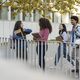 meeting of young multiracial students outdoors - on the campus of the university - - PhotoDune Item for Sale
