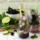 Homemade refreshing citrus lemonade mojito blackberry with  ingredients for making on wooden table. - PhotoDune Item for Sale