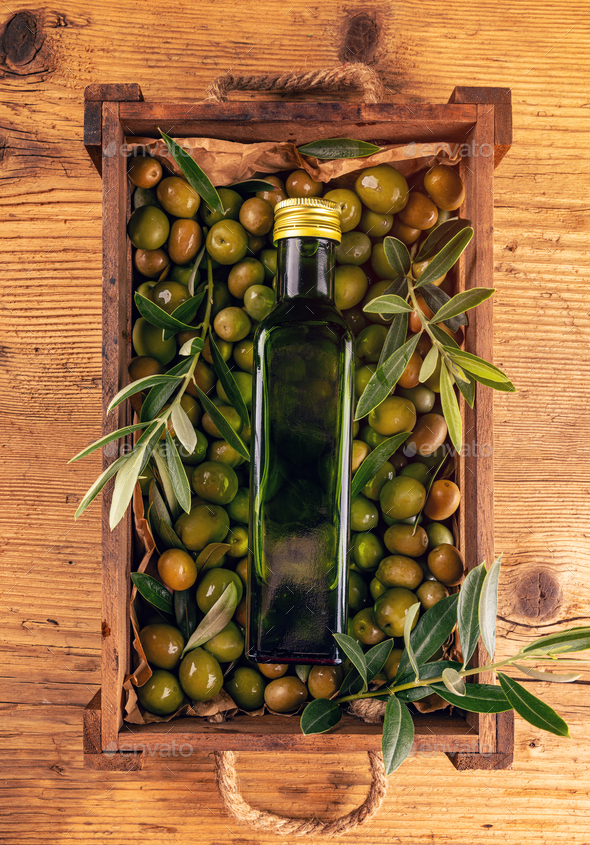 Green ripe olives and oil - Stock Photo - Images