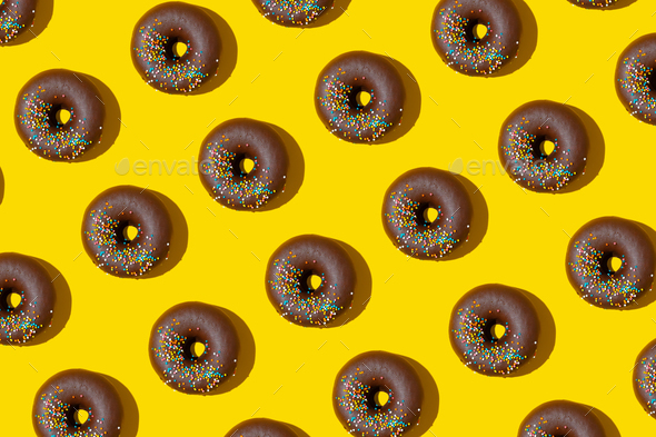 Chocolate Donuts Pattern On Yellow Background. Top View, Flat Lay - Stock Photo - Images