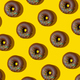 Chocolate Donuts Pattern On Yellow Background. Top View, Flat Lay - PhotoDune Item for Sale