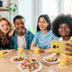 Multiethnic friends taking a selfie while having breakfast at home - PhotoDune Item for Sale