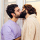 happy couple of gay men kissing at home - PhotoDune Item for Sale