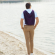 back view of stylish man walking alone on sandy riverbank - PhotoDune Item for Sale