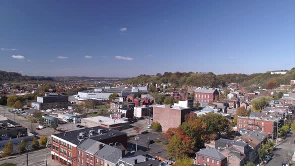 A daytime rotating aerial establishing shot of Pittsburgh's Manchester residential neighborhood. alt