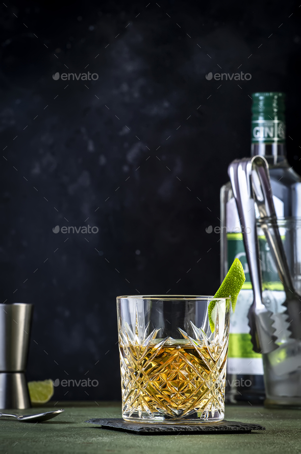 White negroni cocktail with dry gin, white vermouth and herbal aperitif