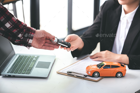 Employees sell keys to customers after agreeing to buy and sell cars. Approve auto loan contracts to