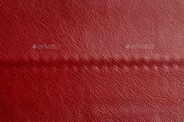 Red leather texture background. Luxury genuine textile surface material