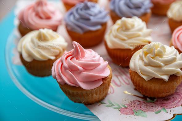 Closeup of homemade delicious cupcakes made for Birthday party in a selective focus - Stock Photo - Images