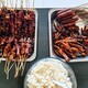 Grilled pork barbecue and chicken feet and a bowl of rice for friends gathering. - PhotoDune Item for Sale