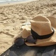Relaxing on a sandy beach with my sun protective gears. - PhotoDune Item for Sale
