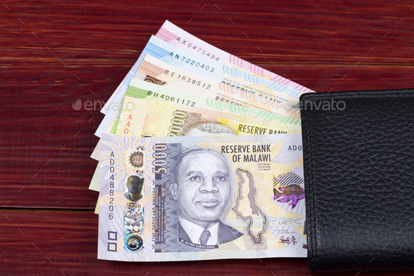 Malawian kwacha in the black wallet - Stock Photo - Images