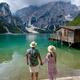 couple visit Braies Lake Lago di Braies Italian Dolomites alpine lake Italy, Europe - PhotoDune Item for Sale