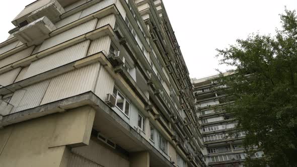 The Facade of a Highrise Residential Building with Unusual Balconies