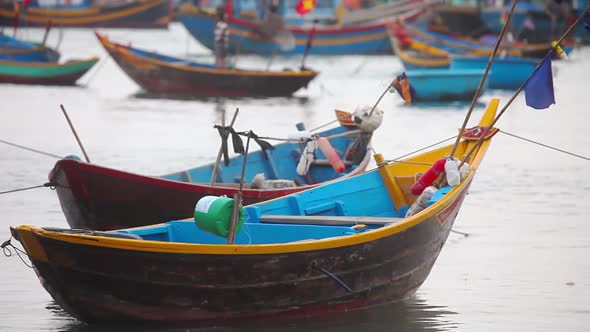 Fishing boats swing on the waves