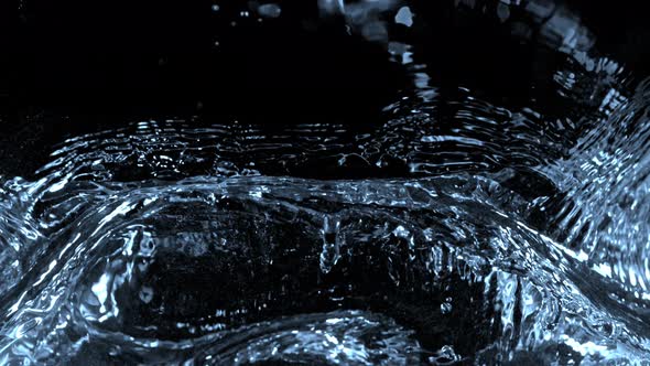Super Slow Motion Shot of Water Splash at 1000Fps Isolated on Black Background alt