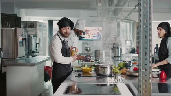 Authentic Cook Doing Cooking Show Lesson on Camera in Kitchen alt