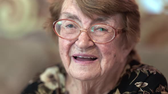 Indoor Portrait of Happy Elderly Woman