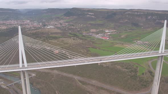 Aerial view of the Millau Viaduct over the valley alt