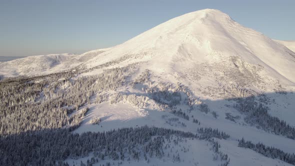 Aerial View of Big Mountain Range at Sunrise