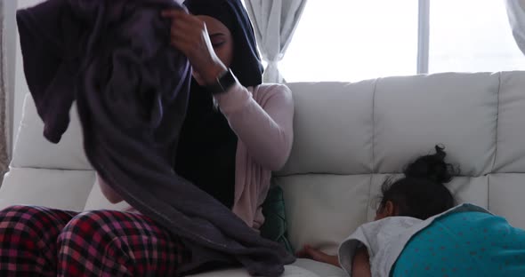 Mother and daughter at home alt