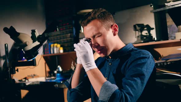 Goldsmith Is Smiling After Looking at the Ring alt