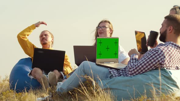Colleagues Sit in Nature and Discuss Important Points of the Project and Listen to the Opinion Woman alt