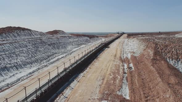 Salt Piles Aerial View of Industrial Quarries Conveyor in Salt Pits Mining of Salt Conveyor Line in alt