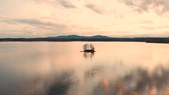 Aerial View of a Small Island in the Center of the Lake alt