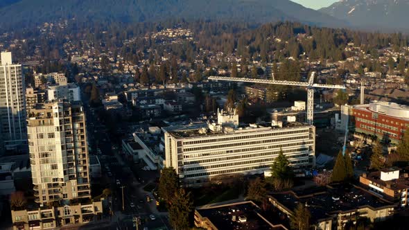 Panorama Of North Vancouver City With Lions Gate General Hospital And Forest Mountains Ridges Backgr alt