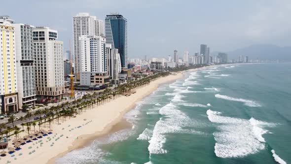 Aerial View of Impressive Coastal City Beach with High Rise Buildings Resorts and Hotels alt