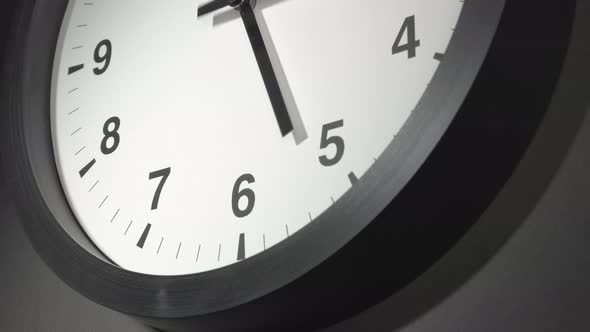 Clock Face In Time Lapse On Dark Grey Wall 
