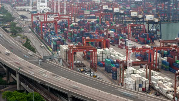 Hong Kong Container Port Terminal and Logistics Center Timelapse Pan Up alt