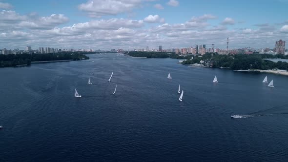 Gorgeous Bird's Eye View of Yachts Race Across the River